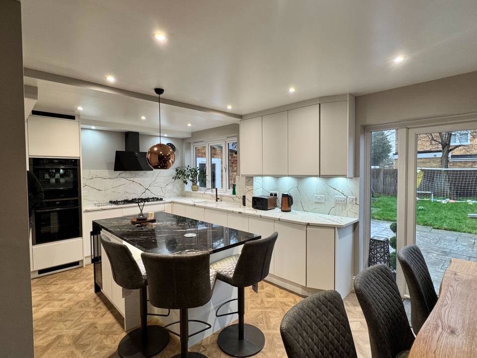 A kitchen design that is unique with a selection of different colours